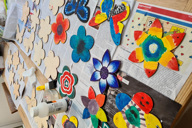 The butterflies and flowers will be placed on a wall somewhere in Chiswick