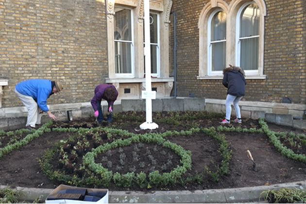 Planting the Flagpole Garden in March 2015