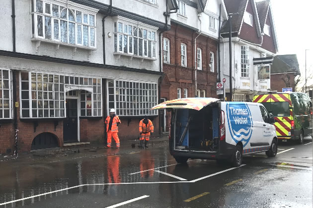 Water spread from the leak along the length of Bath Road