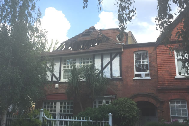 The damage to the roof the day after the fire