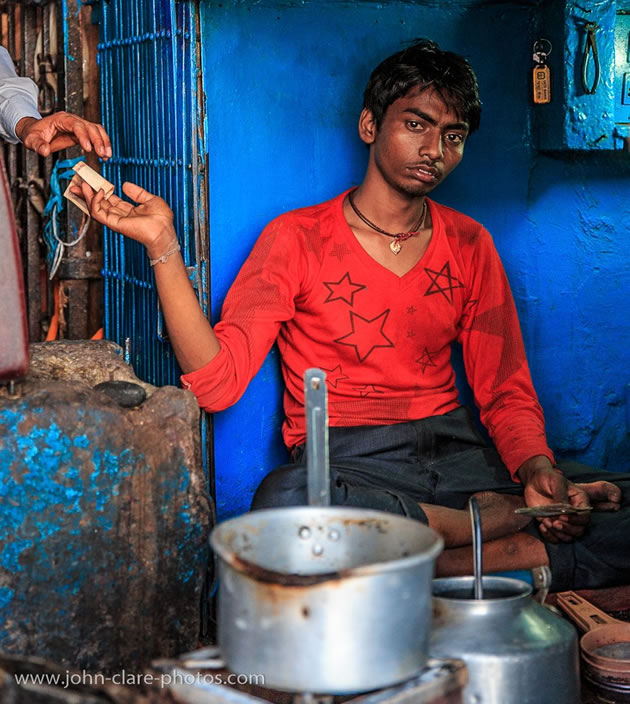 boy selling tea in Delhi by john clare