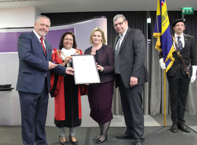 mary macleod accepts freedom of hounslow for local british legion