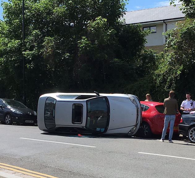 Car Overturns Near Grove Park Bridge 