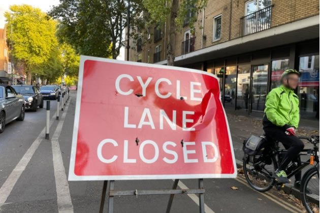 closed cycle lane with cyclist
