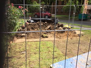 hole in ground outside flats