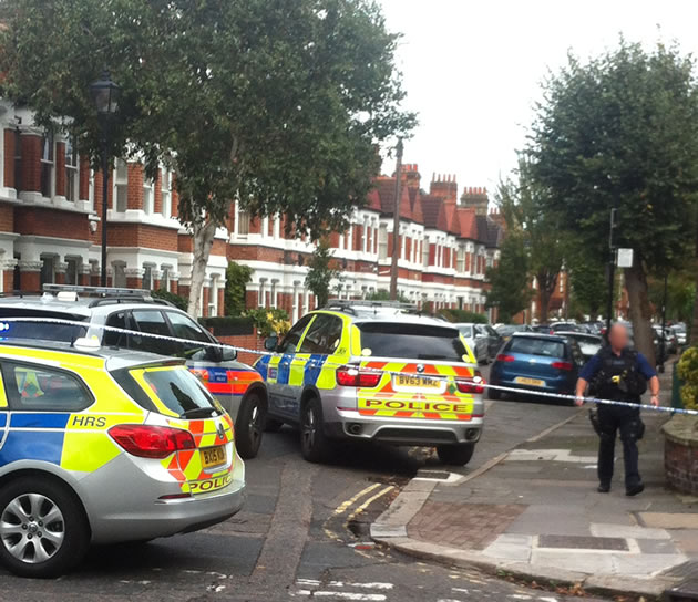 Armed officers raid house in quiet Chiswick street