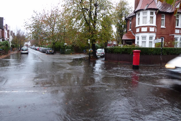 Standing water on a road near Chiswick Park station