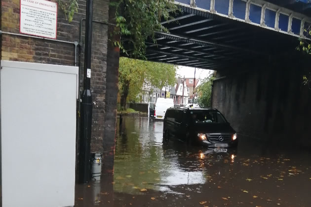 The underpass at Acton Lane railway bridge was flooded