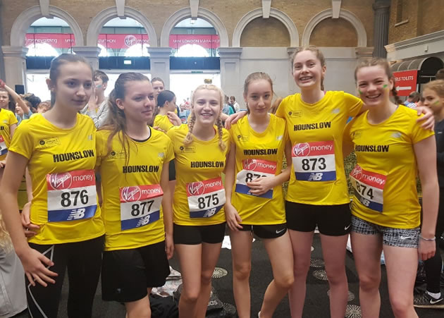 girls team in marathon