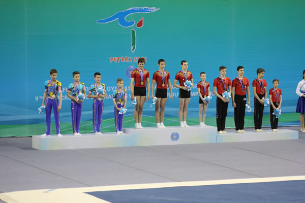 Podium image of winning teams including British at the chinese acrobatics competition in Putian 