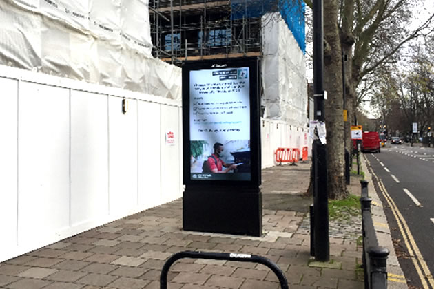 Obstructive board next to 426 Chiswick High Road 