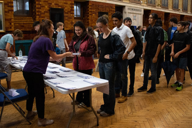 Latymer Upper students queue to collect their results 
