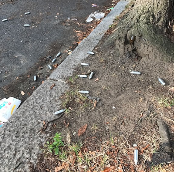 nitrous ozide dumped after people take legal highs in strand on the green