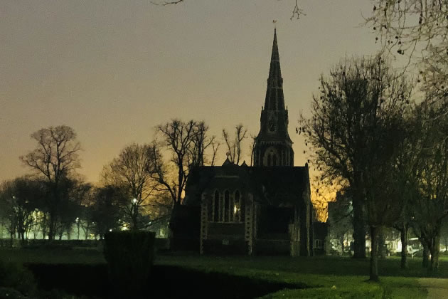 Christ Church on Turnham Green illuminated by the glow