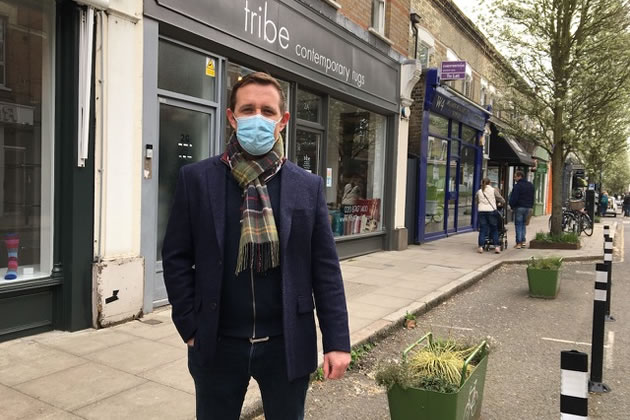 Patrick in front of shops in Devonshire Road, Chiswick Homefields ward