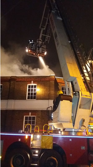 Fire fighters battle the blaze on Strand-on-the-Green