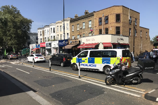 Police van on Chiswick High Road following the arrest 