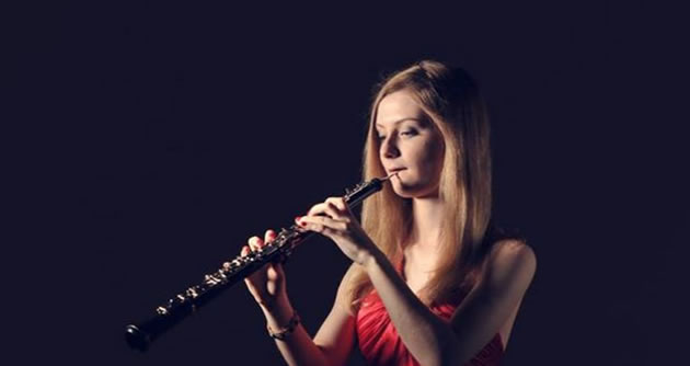Polly Bartlett playing oboe