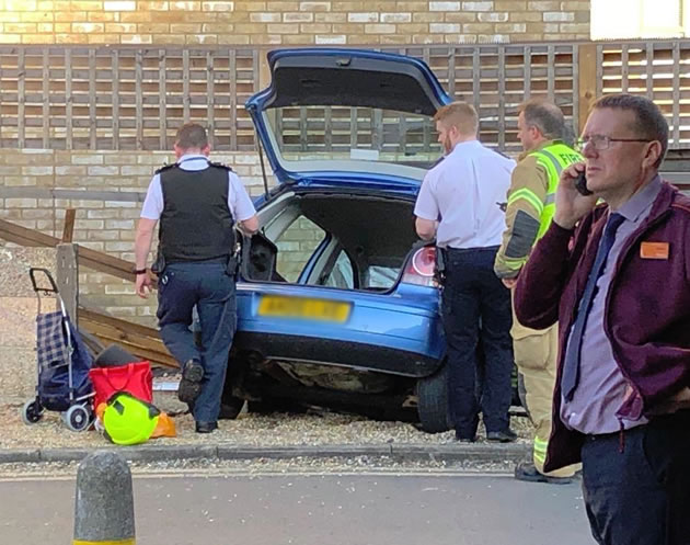 Car Crashes Through Fence Outside Sainsbury's 