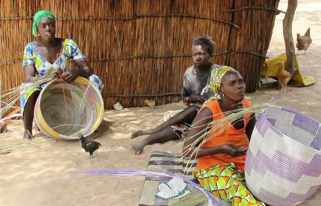 women weaving baskets in Senegal