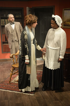 image from the Sherlock Holmes play of three actors on stage