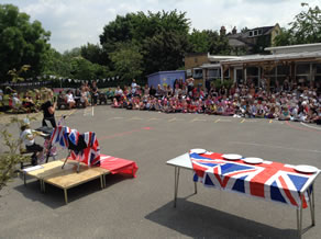 school assembly at strand for queens birthday 