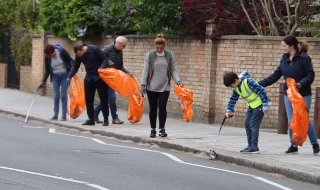 the volunteers in action clean up 