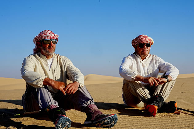 Adam Wilton and Gavin Booth sitting in the desert
