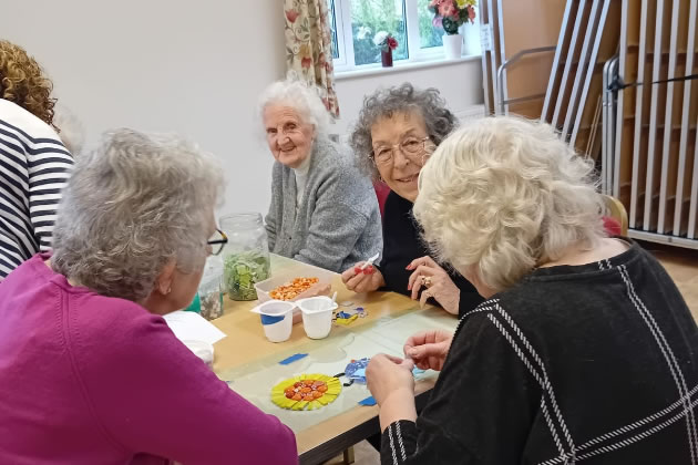 Club members working on the mural