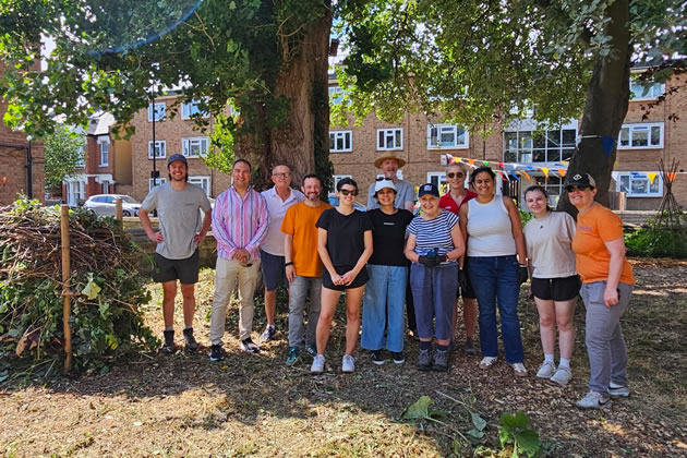 The volunteers take a break from working at the site in Acton Green 