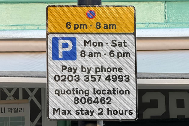 The sign outside Nami Oriental has different waiting restrictions to the one at the entry to Devonshire Road