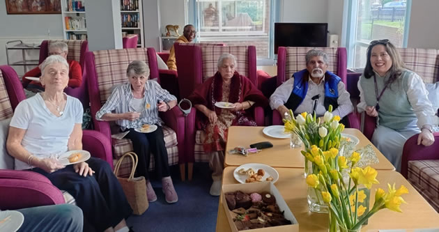 Gabriella with residents from Meadowcroft enjoying a chat over tea