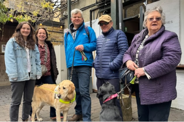 Sarah left, Adrian centre, Guide Dog owners Chris and Jackie right