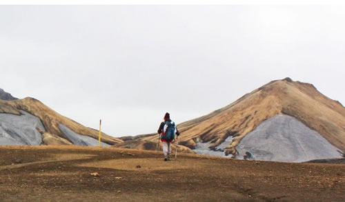 image of person trekking across iceland 