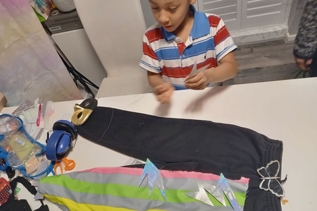 Jojo making his superhero costume