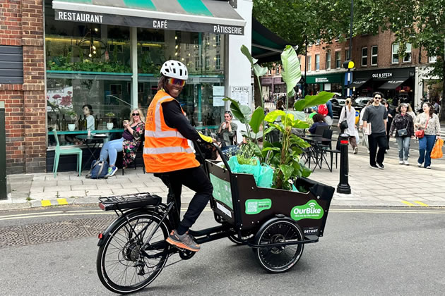 Turnham Green councillor Ron Mushiso making a delivery 