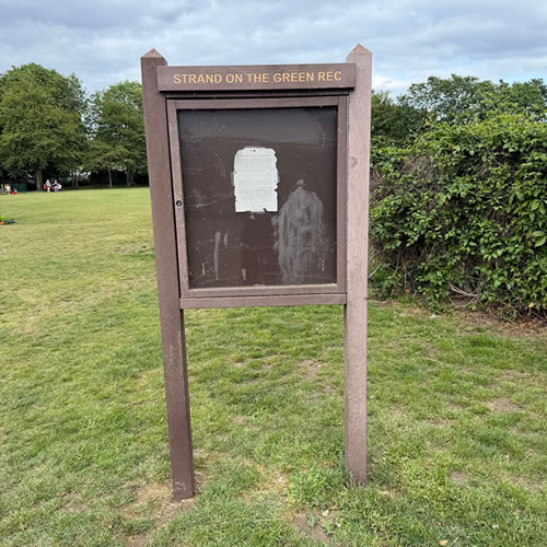 Unloved notice board at the entrance to Strand on the Green Rec.