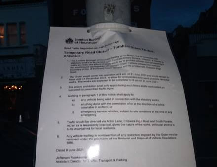 A NOTICE IN TURNHAM GREEN TERRACE PINNED TO A POST